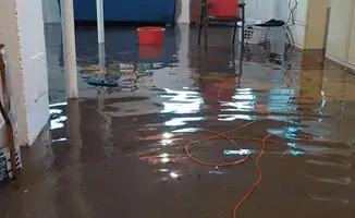 Basement with boiler, cabinets and washing machine completely flooded in Houston, TX