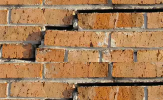 Brick wall with serious structural damage in Houston, TX